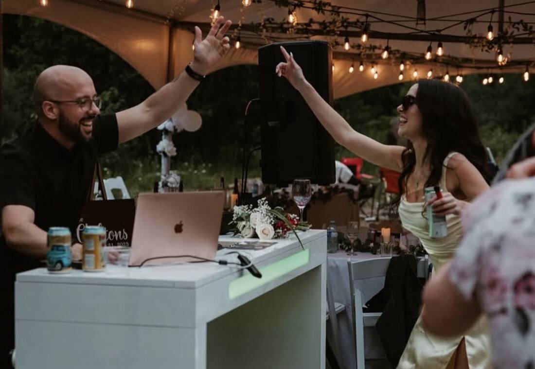 Zack Braddick of Pardy DJ Co. celebrating with a bridesmaid at a Fraser Valley wedding